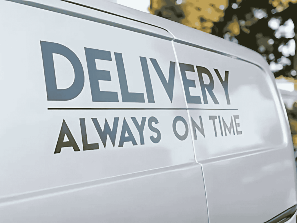 A Clockwork Moving delivery truck with a promise of "Always on Time" service in Weddington, NC.